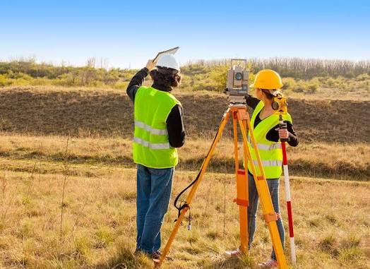 Land surveying at a construction site